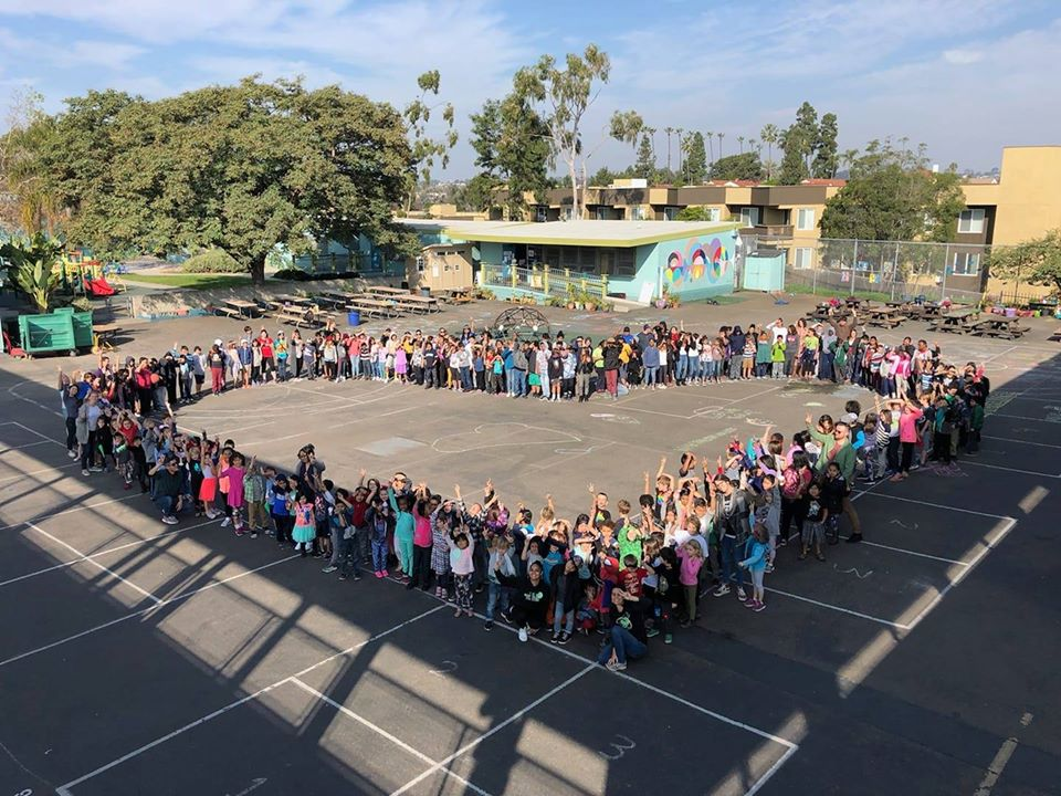 Students form a heart at Mountain View, a San Diego community school.